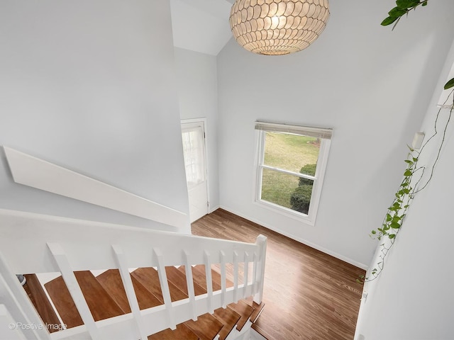 133 Abbeywood Cir, Streamwood, IL 60107 - staircase featuring baseboards and wood finished floors