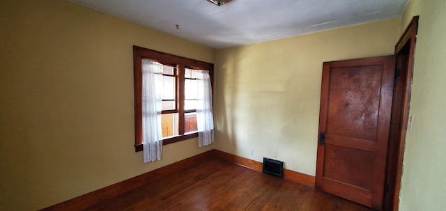 627 S 2nd St, Saint Charles, IL 60174 - unfurnished room featuring dark wood-type flooring and baseboards
