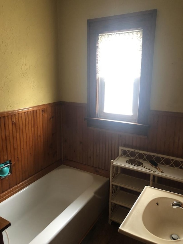 627 S 2nd St, Saint Charles, IL 60174 - full bath featuring wainscoting, a garden tub, and wood walls