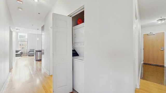 8 W Monroe St Unit 1507, Chicago, IL 60603 - corridor with stacked washer and clothes dryer and light wood finished floors