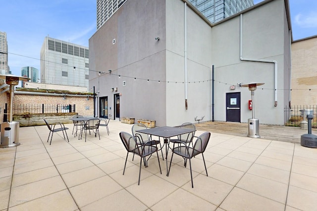 8 W Monroe St Unit 1507, Chicago, IL 60603 - view of patio with outdoor dining area and a view of city