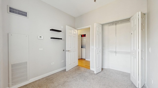 8 W Monroe St Unit 1507, Chicago, IL 60603 - unfurnished bedroom featuring carpet floors, baseboards, and a closet