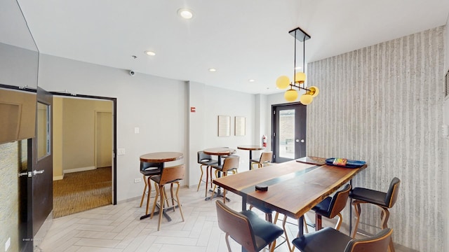 8 W Monroe St Unit 1507, Chicago, IL 60603 - dining room featuring wallpapered walls, recessed lighting, and an accent wall