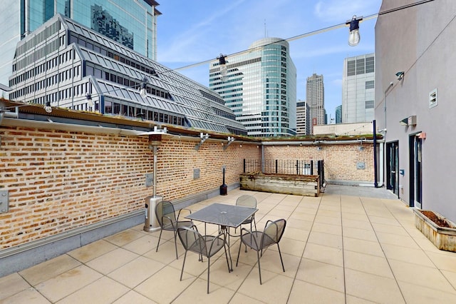 8 W Monroe St Unit 1507, Chicago, IL 60603 - view of patio / terrace featuring a view of city and outdoor dining space