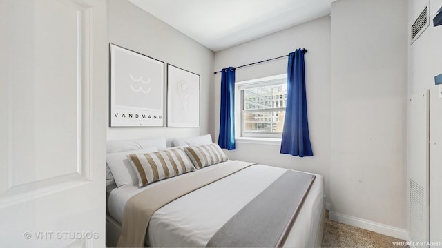 8 W Monroe St Unit 1507, Chicago, IL 60603 - bedroom with baseboards and carpet
