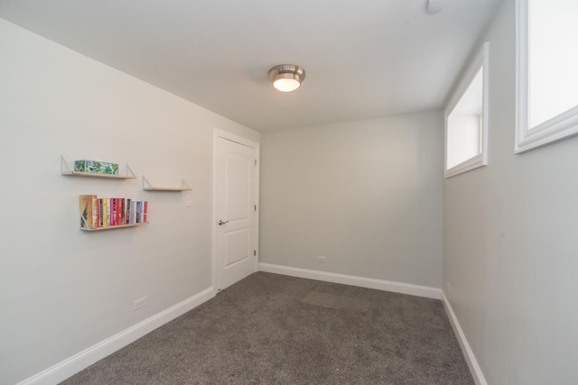 1615 W Superior St, Chicago, IL 60622 - spare room featuring dark colored carpet and baseboards