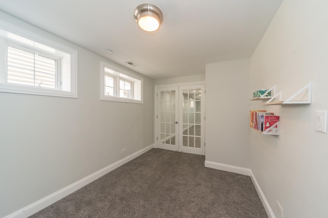 1615 W Superior St, Chicago, IL 60622 - unfurnished room featuring french doors, dark colored carpet, and baseboards