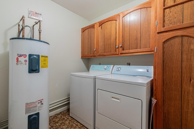 laundry area featuring cabinet space, washing machine and dryer, and water heater