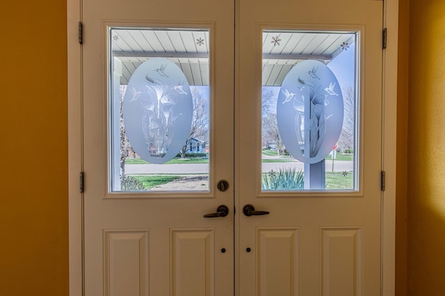 entryway featuring french doors