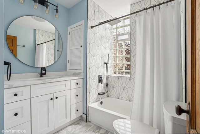 full bath featuring toilet, marble finish floor, vanity, and shower / tub combo with curtain