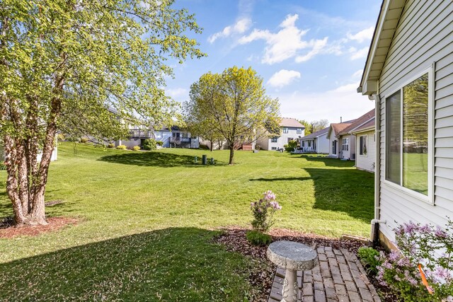 view of yard featuring a residential view