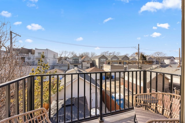 balcony featuring a residential view