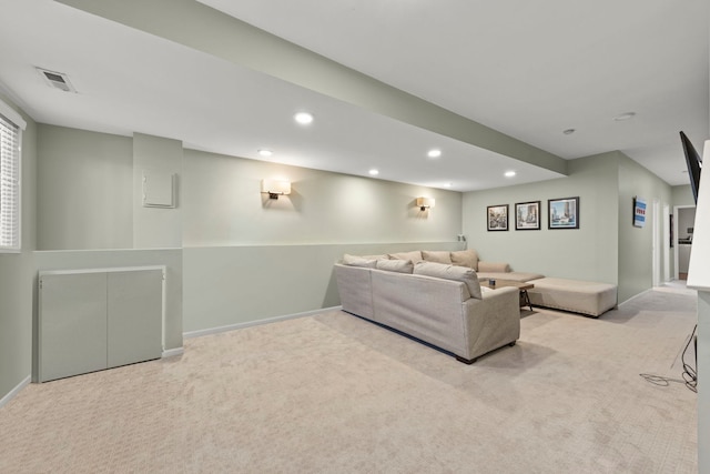 living room with carpet floors, baseboards, recessed lighting, and visible vents