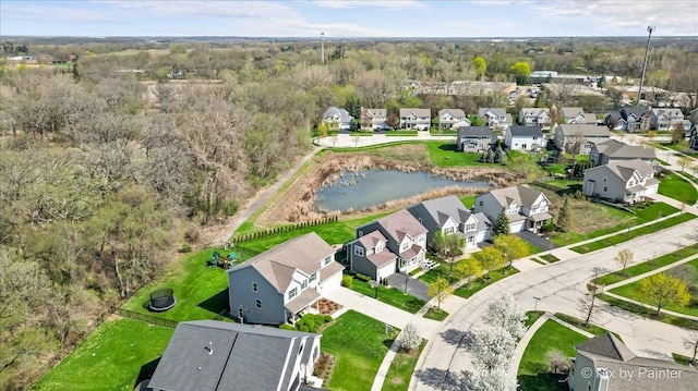 birds eye view of property featuring a residential view and a water view
