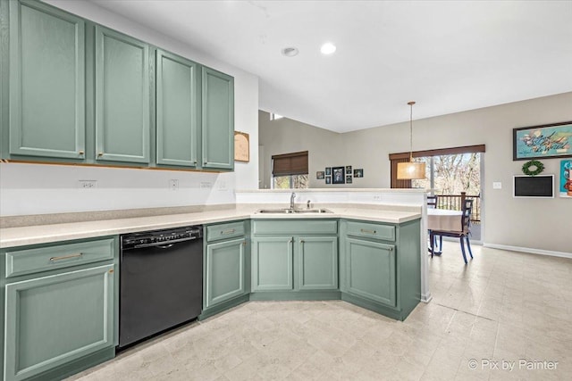 kitchen featuring green cabinetry, a sink, dishwasher, and a peninsula