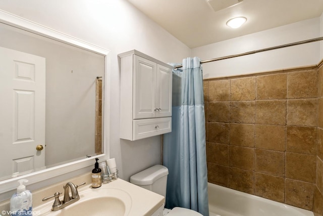 bathroom with toilet, shower / tub combo with curtain, and vanity