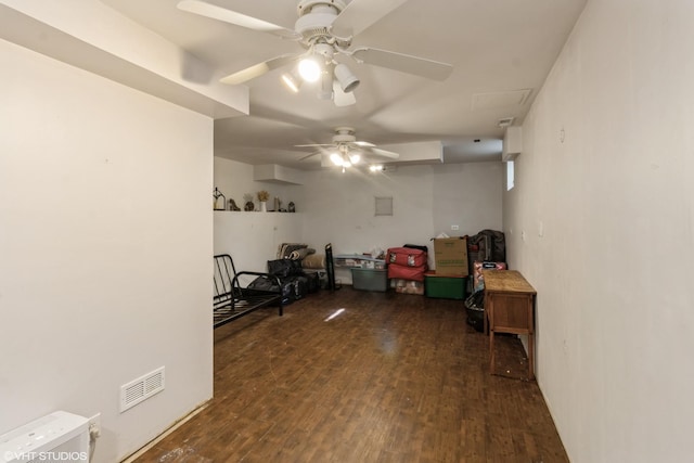 interior space featuring ceiling fan and wood finished floors