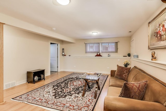 5740 Alabama Ave, Clarendon Hills, IL 60514 - living area with wood finished floors, visible vents, and baseboards