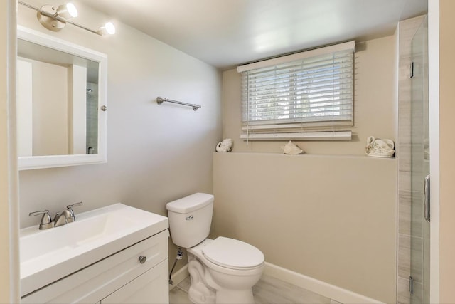 5740 Alabama Ave, Clarendon Hills, IL 60514 - full bathroom featuring toilet, a shower with door, vanity, and baseboards