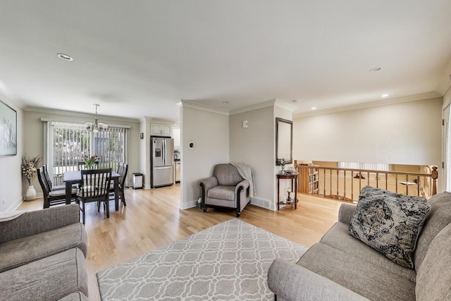 5740 Alabama Ave, Clarendon Hills, IL 60514 - living room with baseboards, light wood-style floors, a chandelier, and crown molding