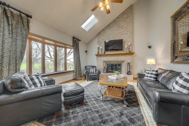 2624 Haddassah Dr, Naperville, IL 60565 - living area with ceiling fan, high vaulted ceiling, a fireplace, a skylight, and wood finished floors
