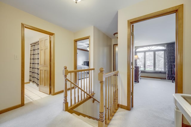 2624 Haddassah Dr, Naperville, IL 60565 - hallway with carpet floors, baseboards, and an upstairs landing