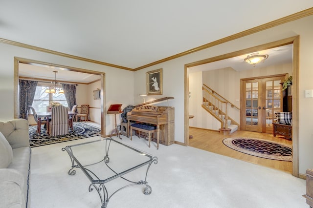 2624 Haddassah Dr, Naperville, IL 60565 - living room featuring a notable chandelier, baseboards, french doors, stairs, and carpet