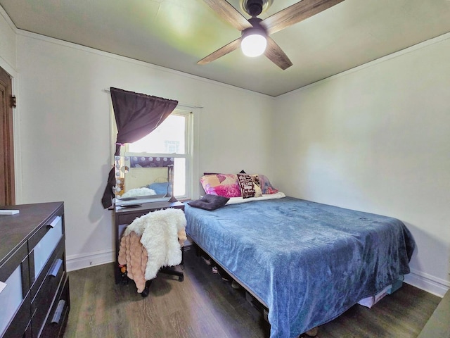 3715 Clinton Ave, Berwyn, IL 60402 - bedroom featuring wood finished floors, a ceiling fan, and baseboards