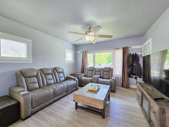 3715 Clinton Ave, Berwyn, IL 60402 - living area with light wood finished floors and a ceiling fan