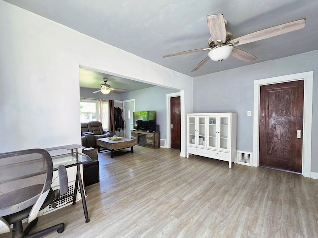 3715 Clinton Ave, Berwyn, IL 60402 - office with light wood-type flooring, ceiling fan, and baseboards