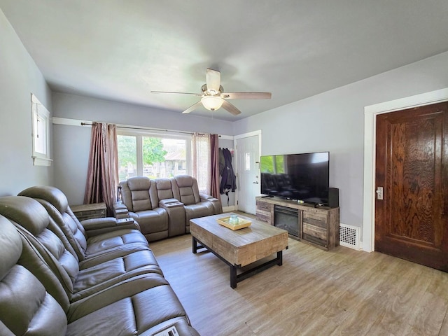 3715 Clinton Ave, Berwyn, IL 60402 - living area featuring light wood finished floors and ceiling fan