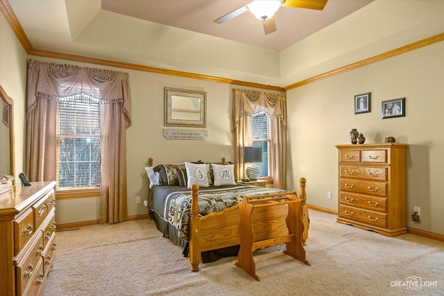 bedroom featuring light colored carpet, baseboards, and ceiling fan