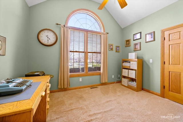 carpeted office with visible vents, ceiling fan, baseboards, and vaulted ceiling