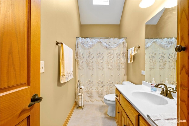 full bath featuring vanity, a shower with curtain, tile patterned flooring, toilet, and baseboards