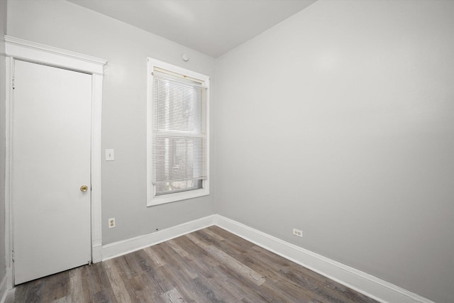 6611 S Peoria St, Chicago, IL 60621 - unfurnished bedroom with wood finished floors and baseboards