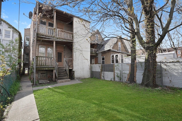 6611 S Peoria St, Chicago, IL 60621 - rear view of property with a balcony and brick siding