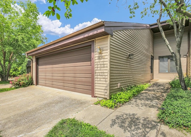 1804 Glenwood Oaks Ct Unit A, Urbana, IL 61801 - view of property exterior with a garage