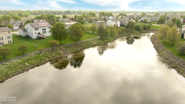 aerial view with a water view and a residential view