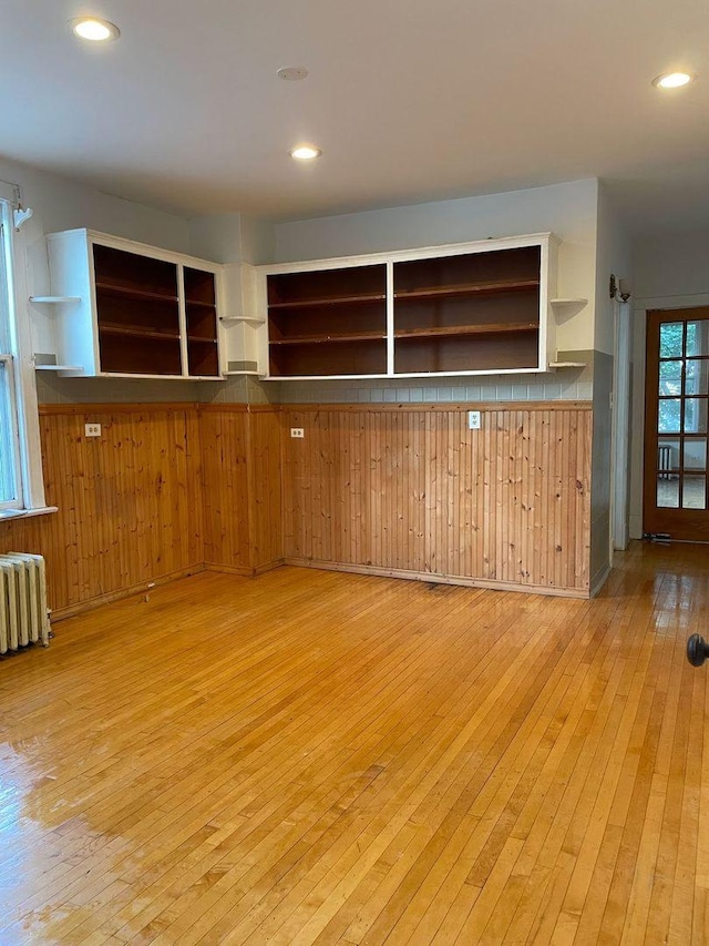 2500 Clarence Ave, Berwyn, IL 60402 - kitchen with radiator, light wood-style floors, and open shelves