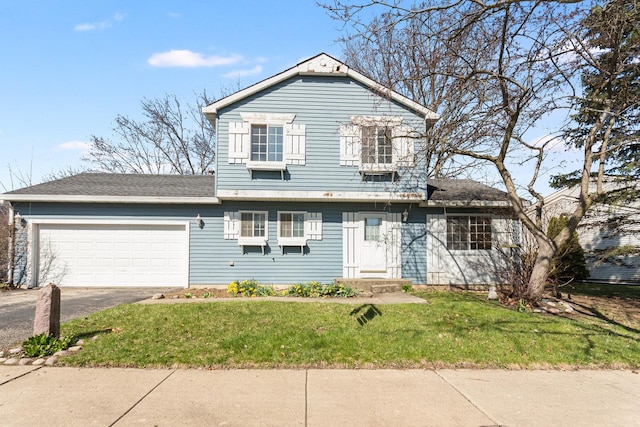 view of front of property with a garage, aphalt driveway, a shingled roof, and a front yard