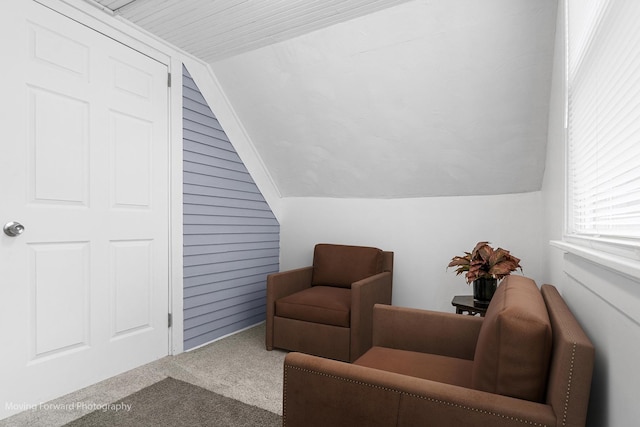 11945 S State St, Chicago, IL 60628 - living area featuring carpet flooring and vaulted ceiling