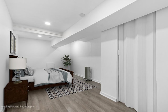 11945 S State St, Chicago, IL 60628 - bedroom featuring baseboards, recessed lighting, and wood finished floors