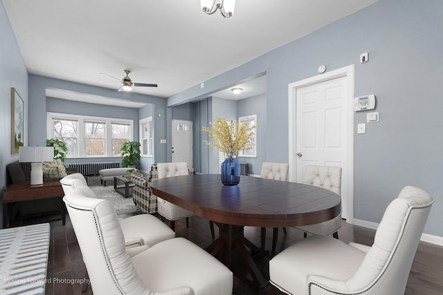 11945 S State St, Chicago, IL 60628 - dining area featuring radiator, baseboards, a ceiling fan, and wood finished floors