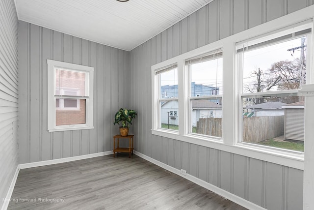 11945 S State St, Chicago, IL 60628 - unfurnished room featuring baseboards and wood finished floors