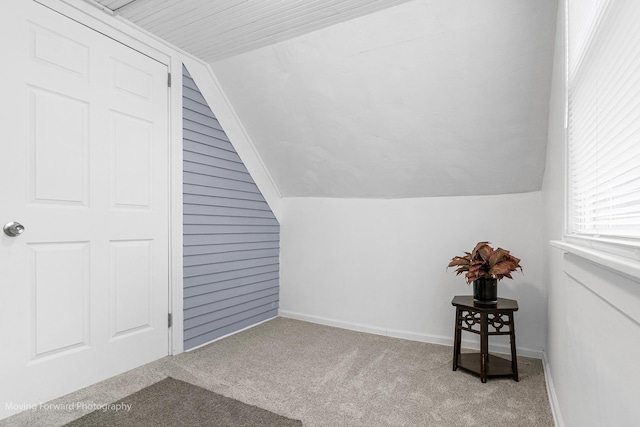 11945 S State St, Chicago, IL 60628 - additional living space featuring carpet floors, baseboards, and vaulted ceiling