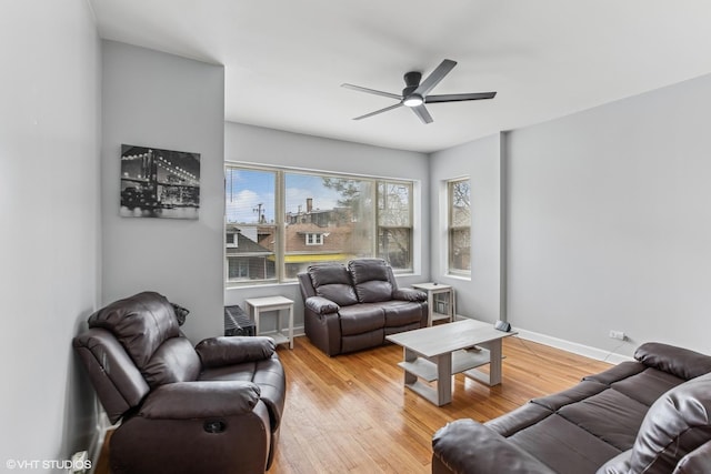 7204 S Cornell Ave, Chicago, IL 60649 - living room with light wood-style flooring and ceiling fan