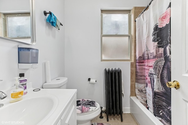 7204 S Cornell Ave, Chicago, IL 60649 - bathroom with toilet, shower / bathtub combination with curtain, radiator, vanity, and tile patterned floors