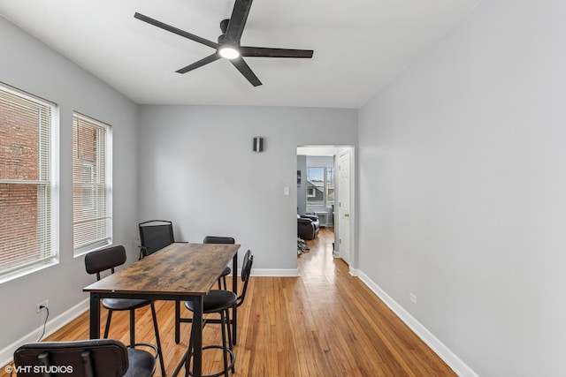 7204 S Cornell Ave, Chicago, IL 60649 - dining space with light wood-style floors, baseboards, and a ceiling fan