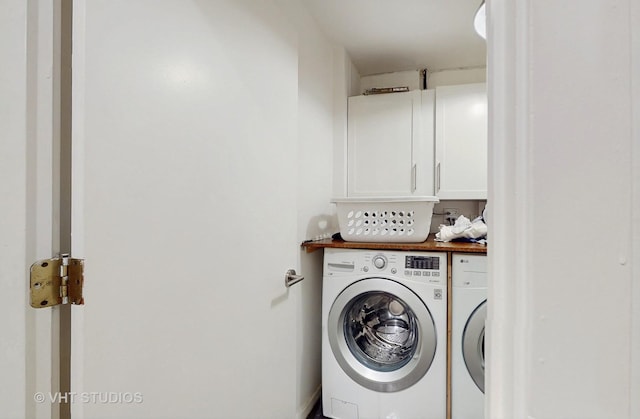 1341 N Wolcott Ave Unit A, Chicago, IL 60622 - washroom featuring cabinet space and separate washer and dryer