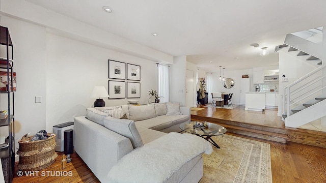 1341 N Wolcott Ave Unit A, Chicago, IL 60622 - living area featuring stairs, light wood-type flooring, and recessed lighting